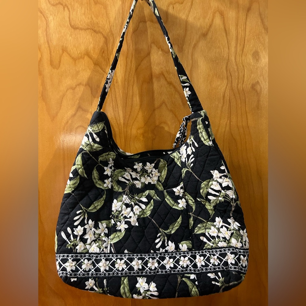Vera Bradley purse. Washable if you remove the inside bottom hard part.